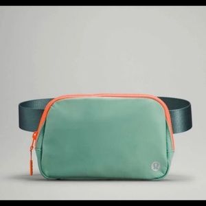 Lululemon Everywhere Belt Bag in Teal and Neon Orange
